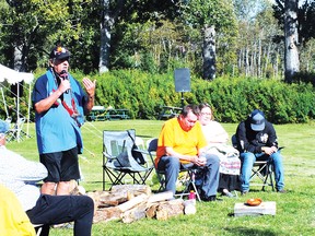 Photo by LESLEY KNIBBS
Elder Richard Assinewea, an Anishinaabe from Wikwemikong led the ceremonies, in the foreground former Sagamok chief Nelson Toulouse, Sagamok Chief Alan Ozawanimke, Gloria Daybutch representing Mississauga council, and Chief Brent Bissaillion from Serpent River First Nation.