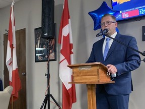 With his wife Justine and children Caroline, Ainsley and Bennett watching proudly, re-elected Perth-Wellington MP John Nater gives his acceptance speech at the Mitchell Golf & Country Club Sept. 20. ANDY BADER/MITCHELL ADVOCATE