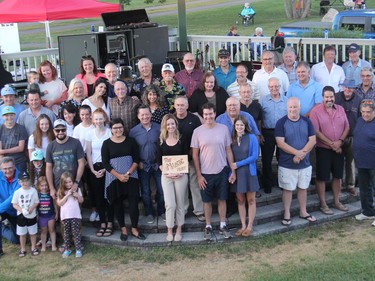 Family and friends of the late Mel Gardner gather on stage at the Riverwalk Amphitheatre in Pembroke for a group photo during a tribute night to the popular Ottawa Valley entertainer held on Sep. 1.
