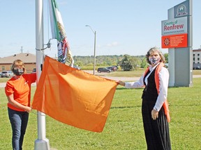 On Sept. 1, Renfrew County Warden Debbie Robinson (left) and Chief Wendy Jocko of the Algonquins of Pikwakanagan First Nation took part in a ceremony to raise an orange flag at the County of Renfrew administration building on International Drive.