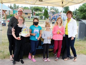 Laurentian Valley Coun. Jennifer Gauthier-Kuehl (left) and Reeve Debbie Robinson (right) presented the awards to the top-four finishers in the ages six to eight category in the LV Junior Gardeners competition. Accepting their prizes were Billie Bennett, first; Leah McEwan, second; Riven Schilkie-White, third and Xavia Forget-Mask, fourth.
