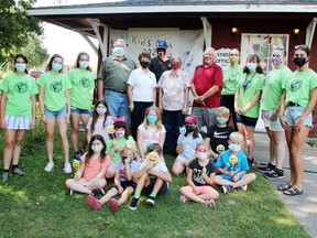 The year-end fiesta for the Kids' Days program at the Champlain Trail Museum and Pioneer Village included a thank you to program sponsors. On hand to celebrate the donation were (back from left) camp leaders Marissa Poff, Yulen Fraser, Katie Mustard, Robert Lauder and Malcolm Montgomery representing the Kiwanis Club of Pembroke, Laurette Halliday and Wanda Lavergne from the Pembroke Legion, Bruce Lloyd from the Alice and Fraser Minor Sports Association, museum curator Angela Siebarth, camp leaders Daria Gillis, Georgia Templar and Anna Cowan, (middle row from left) camp participants Lauren McBride, Espe Torres-O'Brian, Kevlyn-Lee Hamelin, Madison Yuke, Beckham Impens and (front from left) Breanna McBride, Lincoln Gagnon, Ronin Yuke, Delaney Impens and Keiron Hamelin.