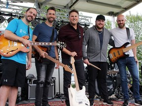 Country music artist Jason Blaine (centre) is thrilled to be back home in the Ottawa Valley for his annual charity event and especially happy to be back on stage with his band for the first time since 2019. During the sound check at the Pembroke Golf Club, he was joined by (from left) Chad Murphy, Jordan Honsinger, Shawn Moore and Holt Stuart.