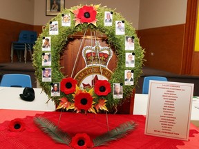 A wreath with the photos of the Branch 72 and Ladies Auxiliary members sat at the front of the Pembroke Legion main hall for the annual memorial service on Sept. 19. The wreath was made by branch manager Wanda Lavergne.