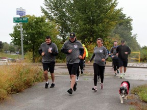 Participants in the Renfrew County police and peace officer memorial run held on Sept. 24 ran from Pembroke to Petawawa along the Algonquin Trail. About a dozen runners and cyclists took part.