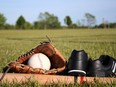 Baseball glove, bat and a ball