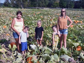 Bev Walkom (left) and daughter-in-law Tammi will host a pumpkin patch gathering Sept. 18, co-hosted by Miles Walkom, 4, Malea, 7 and Maeve, 3 at the corner of Perth Road 163 and Line 26. There promises to be something for everyone! ANDY BADER/MITCHELL ADVOCATE