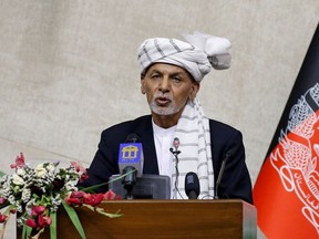 Afghan President Ashraf Ghani speaks at the parliament in Kabul, Afghanistan, on Aug. 2.