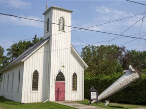 A storm late Sept. 12 tore the steeple off of the 125-year-old Trinity Chapel in Ailsa Craig. The defunct chapel is owned by the North Middlesex Historical Society. Derek Ruttan/Postmedia Network