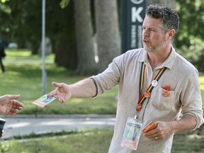 Kevin Kruchkywich, the federal NDP candidate for Perth-Wellington, hands out campaign material on Wednesday, Sept. 8, near Stratford General Hospital in Stratford, Ont. 

Cory Smith/Stratford Beacon Herald/Postmedia Network