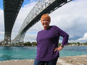 Bonnie Kearns stands under the Blue Water Bridge in Point Edward. Kearns, a registered nurse, spent three weeks following the Sept. 11 attacks 20 years ago working in New York City with the Red Cross. (Paul Morden/The Observer)