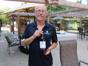 Winemaker Marc Alton is shown in this file photo standing in the patio at Alton Farms Estate Winery in Plympton-Wyoming. The winery is holding its sixth annual grape stomp Saturday afternoon to raise money for the Bluewater Centre for Raptor Rehabilitation.