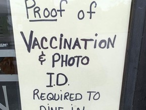 Some non-essential businesses in the local area have posted signs on their front door now that the Ford government's vaccine passport system is in effect. The requirement to provide proof of double-vaccination for COVID-19 at some non-essential businesses and venues took effect Wednesday, Sept. 22.