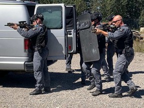Greater Sudbury Police officers and members of the new Tactical Emergency Medics Program conduct a mock exercise Wednesday at the Lionel E. Lalonde Centre in Azilda. Colleen Romaniuk