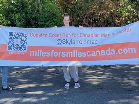 Karla Smith, daughter Elora, and daughter Ryotte have joined Skylar Roth-MacDonald in Quebec to help him complete his run across Canada. Supplied