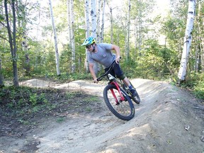 Dave Tindall is a member of the Walden Mountain Bike Club. The group ride, maintain and upgrade the trail system in Naughton, Ont. John Lappa/Sudbury Star/Postmedia Network