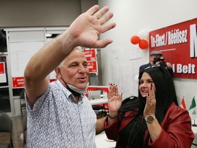 Nickel Belt Liberal candidate Marc Serre and his wife, Lynn, celebrate his victory in the riding early Tuesday morning. John Lappa/Sudbury Star/Postmedia Network