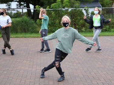 Alexa Lamoureux, of Ecole Ste-Marie, takes part in a celebration with classmates by dancing and singing to music at a celebration for Franco-Ontarian Day in Azilda, Ont. on Friday September 24, 2021. All schools in OntarioÕs 12 French-language school boards participated in a 90-minute virtual celebration on Friday. Students from Conseil scolaire catholique Nouvelon schools participated in the mega celebration by watching a live broadcast at mondrapeaufranco.ca. The broadcast can be viewed until October 1. John Lappa/Sudbury Star/Postmedia Network