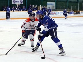Greater Sudbury Cubs forward Atley Gringorten (92) handles the puck under pressure from Soo Thunderbirds defenceman Kyle Trottier (14) during first-period NOJHL action at Gerry McCrory Countryside Sports Complex in Sudbury, Ontario on Thursday, September 30, 2021.