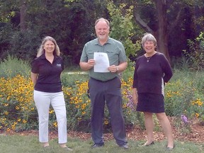 Rotarians Deborah Renaud-McDermott (left) and Don Anderson stand with Jane Anema of the Sarnia Community Foundation at a pollinator garden recently planted at Cathcart Park by the Rotary Club of Sarnia-Lambton After-Hours.