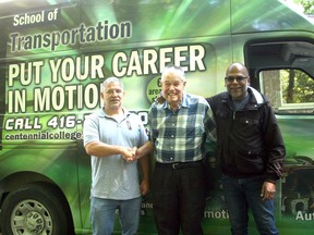 Grand Bend's Norm Tufts, centre, recently donated about 65 boxes of his Ford Canada archives to the Centennial College School of Transportation. The archives consist of technical information and manuals for Ford Canada vehicles from the 1940s to 1989. Centennial College School of Transportation technologists Robert Paul, left, and Iqbal Hosein, right, visited Tufts' home Sept. 8 to collect the archives, which the college will use for research. Scott Nixon