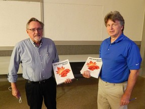 Plympton-Wyoming Historical Society member Don Poland (left) with Sarnia War Remembrance Project author Tom Slater (right) after his presentation on Sept. 15 at the Camlachie Community Centre. Carl Hnatyshyn/Sarnia This Week