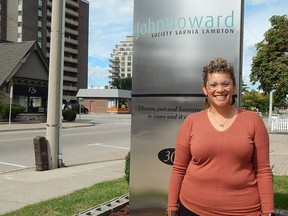 Sarnia Lambton Alliance against Hate project co-ordinator Lindsey Travis stands in front of the John Howard Society Sarnia Lambton offices on Christina Street. Carl Hnatyshyn/Sarnia This Week