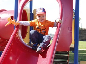 Taylor Wilson, 3, seemed to appreciate the respite from recent days of rainfall. He and his little dinosaur friend were going down the slide at the playground in Hollinger Park on what turned out to be a sunny Thursday afternoon.

RICHA BHOSALE/The Daily Press