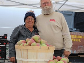 Marion Veens and Kevin Somer of Sunrise Orchards in Arkona, Ont., were just one of the many vendors selling farm fresh produce on Third Avenue in Downtown Timmins on Thursday as part of the BIA's Applefest-themed Urban Park Farmers' Market. The event continues Friday and Saturday.

ANDREW AUTIO/The Daily Press