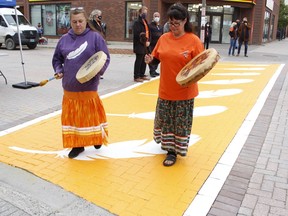 This orange crosswalk with painted feathers in Timmins is similar to the one planned for Southampton. File photo