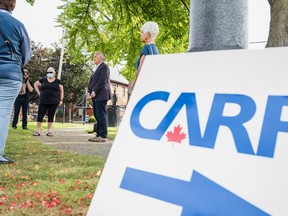 Quinte retirees pressed riding election hopefuls such as Liberal incumbent Neil Ellis Monday in meetings in the Corby Rose Garden Monday in Belleville. ALEX FILIPE