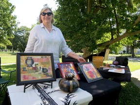 Linda Yeoman's work at Saturday's outdoor art show at Annandale National Historic Site in Tillsonburg featured painted gourds and collages. Yeoman, from Ingersoll, also has 16 pieces of art inside ANHS in the annual Small Wonders Big Talent art show organized by Oxford Creative Connections. (Chris Abbott/Norfolk and Tillsonburg News)
