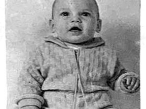 NOT EVEN DAZZLED by the footlights at a tender age of six and a half months, Norman Berthiaume, son of Mr. And Mrs. Robert Berthiaume, graciously accepts applause as the grand champion Cochrane baby. Norman came off with a total of 92 points and, in addition, won first prize for the baby boys over six months at the Cochrane Fall Fair.