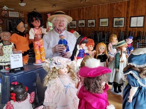 Somewhere in the bevvy of dolls is Dawn Monroe. She has been collecting dolls for decades and has a few on display at the Heritage Village.