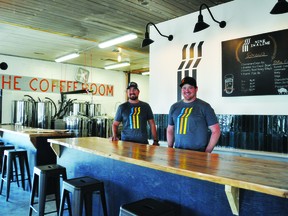 Nine in a line Brewery Co. co-owners Dan Anderson, left, and Dave Markert opened their brewery at 119 First Ave. N. last week.