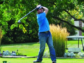 Bill Irwn hits a tee shot on the No. 1 hole at the Vulcan Golf and Country Club on Friday, Sept. 10, when the Vulcan Regional Victim Services Society hosted its golf tournament.