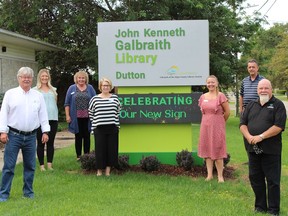 The County of Elgin and the Municipality of Dutton Dunwich recently partnered on the installation of new signage at the Elgin County Library's Dutton branch. Landscaping was contributed by the members of the Dutton-Dunwich Horticultural Society. From left to right are Elgin County Warden Tom Marks, Branch staff Samantha Miller, Emily Finch, Janet Given and Kristy DePierro, Director Brian Masschaele, and Dutton Dunwich Mayor Bob Purcell. Handout