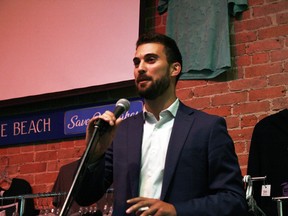 Kenora Conservative candidate Eric Melillo addresses a small crowd of supporters at Bob's Burger Bar following his re-election as Kenora MP on Monday, Sept. 20.