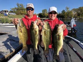 Stuart and Diane Neniska with their big catch of bass from Shoal Lake on Sunday.