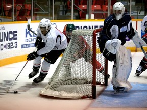 Waterloo's Cedricson Okitundu wheels around the net during an Owen Sound Attack rookie camp scrimmage inside the Harry Lumley Bayshore Community Centre Monday. Okitundu is one of eight rookie defenders and 24 rookies in total to be invited to the Attack's main camp. Greg Cowan/The Sun Times