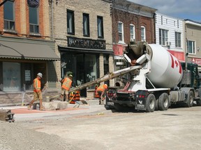 A crew pours coloured concrete in downtown Wiarton in early September as the community's Big Dig project continues toward completion.
(Wiarton Echo photo)