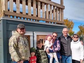 Recipients of this playhouse raffled off in support of the Light up Your Life Society. Submitted Photo.