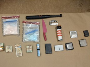 More than an ounce of fentanyl, weapons and cash were seized by Kingston Police on Sept. 29, 2021, from a residence on Barrie Street.