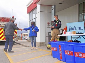 North Bay Fire and Emergency Services holds its annual Fill A Fire Truck drive outside Parker's Your Independent Grocer, Oct. 7, 2020, in support of the North Bay Food Bank. Nugget File Photo