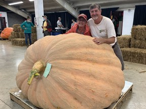 Doris and Ron Wray won the prize for the largest pumpkin at the Norfolk County Fair on Sunday. The Green's Corners couple won top prize and $2,000 with a pumpkin weighing 1,746 lbs.