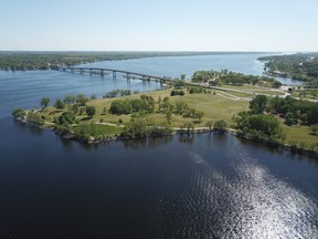 An aerial photo shows the Bay of Quinte shoreline at East and West Zwick's Centennial Parks, foreground, and Prince Edward County in the background. Quinte Conservation is seeking public input during the creation of its first shoreline management plan.