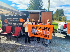 Many student volunteers helped fill the trailer with food items at the Riverview "Fill the Trailer Challenge."