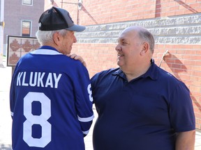 John Manzo and Gary Trembinski celebrate the induction of NHL player Joe Klukay into Sault Ste. Marie's Walk of Fame on Wednesday, Oct. 6, 2021 in Sault Ste. Marie, Ont. (BRIAN KELLY/THE SAULT STAR/POSTMEDIA NETWORK)