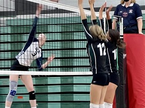 The Spruce Grove Composite High School (SGCHS) senior girls volleyball team (white) are seen here playing against Leduc on Sept. 29.