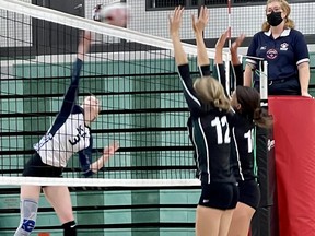 The Spruce Grove Composite High School (SGCHS) senior girls volleyball team (white) are seen here playing against Leduc on Sept. 29.